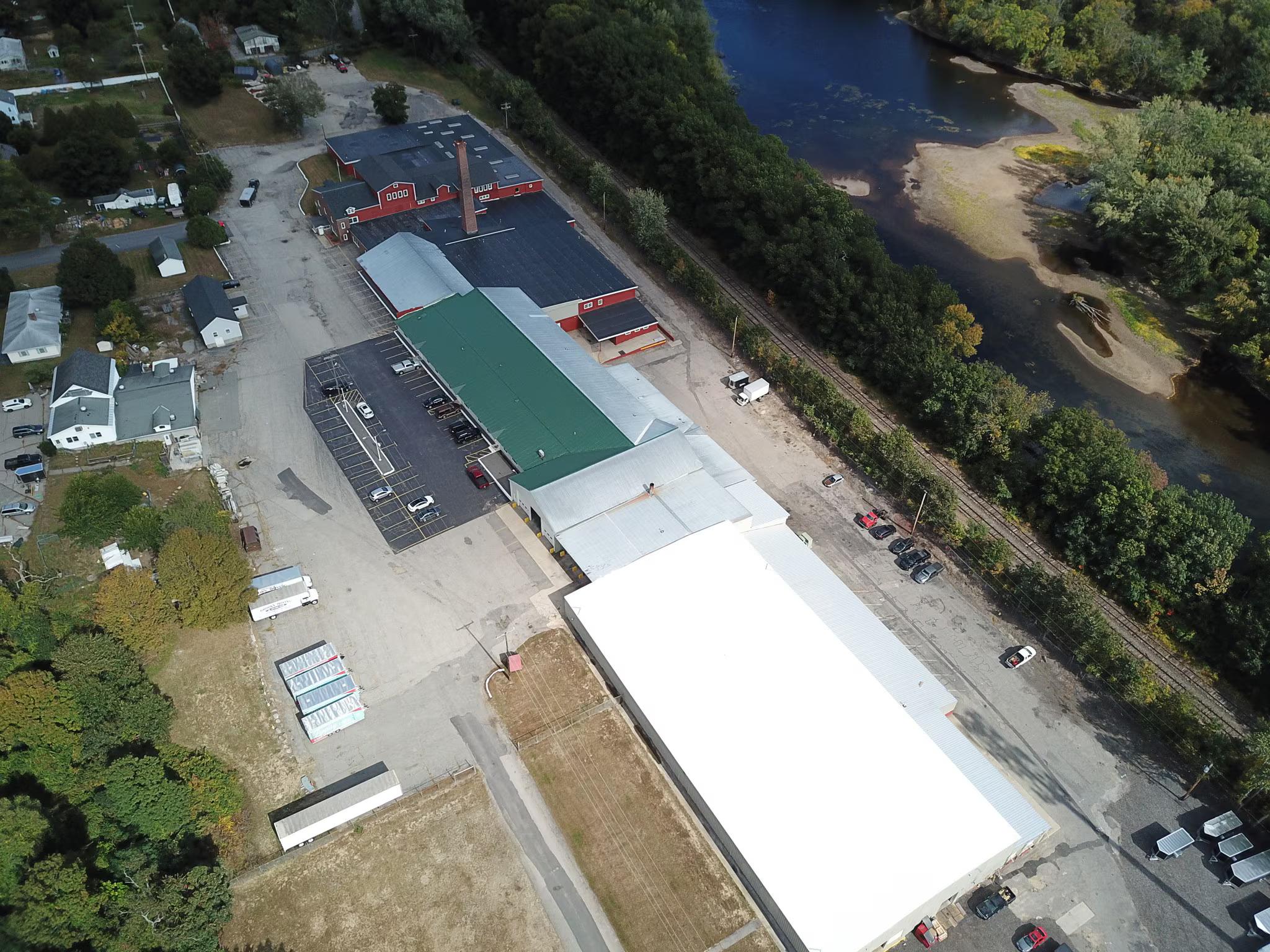 Southern aerial view highlighting clear site access and parking space