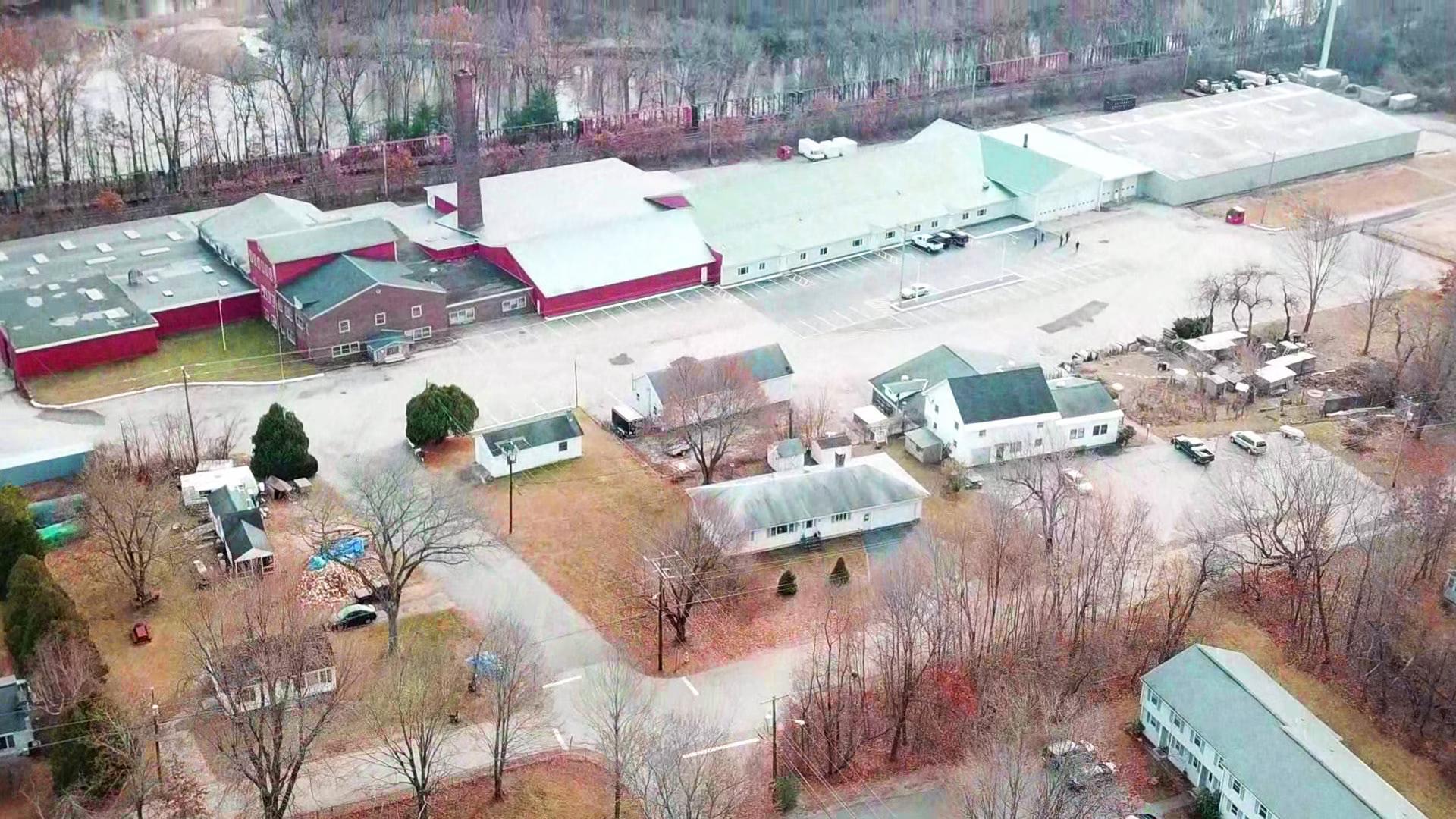 Northern aerial view detailing the roofline and nearby turnpike exit